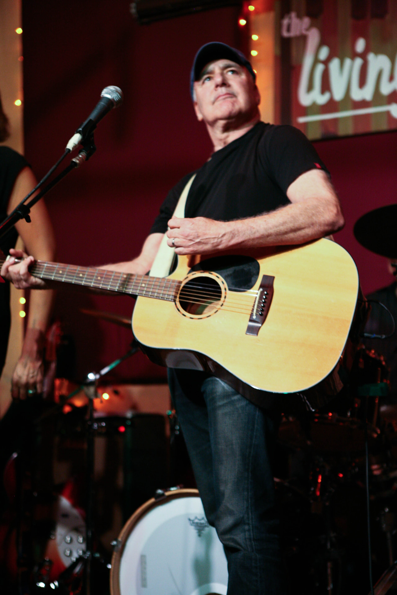 Harry Spero on acoustic guitar at The Living Room