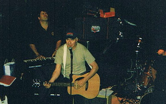 Harry Spero on acoustic guitar with Loaded