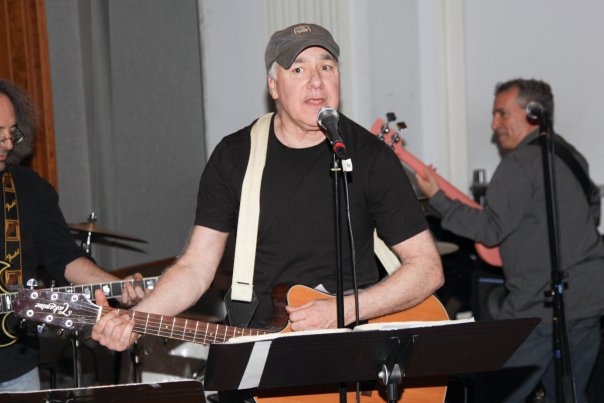 Harry Spero singing and playing guitar during The Tools of Ignorance sessions
